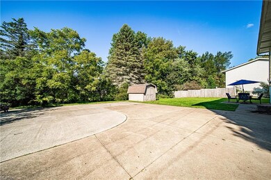 View of patio / terrace with a shed