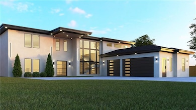 Contemporary house featuring stucco siding, an attached garage, and a front lawn