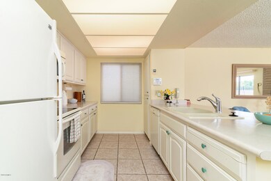 Refinished cabinetry in trendy white