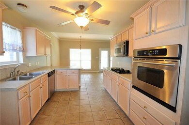 kitchen, gas cooktop, stainless appliances