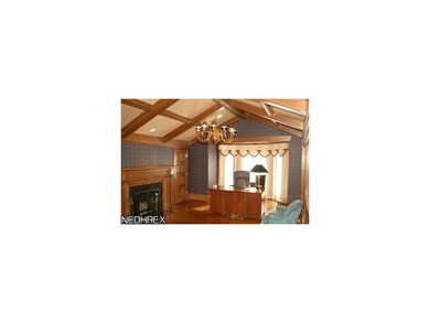 The office with a coffered vaulted ceiling, a wall