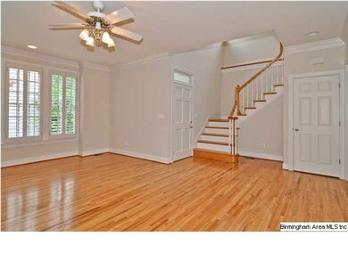The entranceway and stairs to the second level.