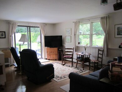 Unit #1 Living room with sliding...