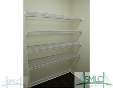 Laundry Room. Plenty of shelving in laundry room f