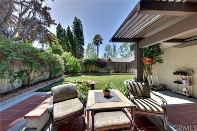 Serene rear patio and large yard with room for a p