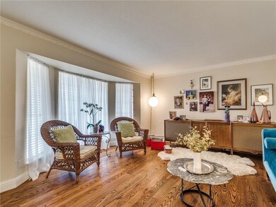 Large bay window maximizes the light in the formal