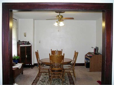 Dining Room. Large room with wood entrance way.