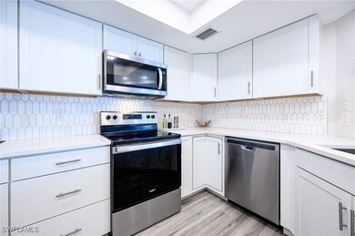 586 Beachwalk Cir unit 205, Naples, FL 34108 - photo 7