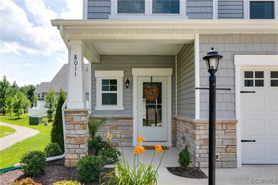 NEWLY added FRONT STORM DOOR.  STONE and VINYL SID