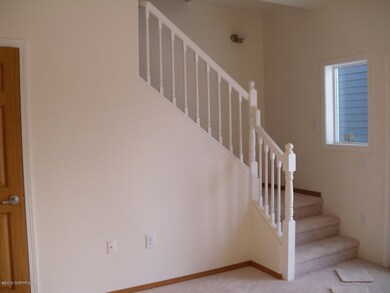 carpeted unit stairway