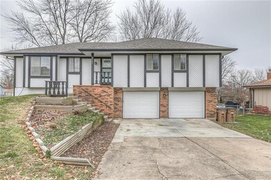 1703 Tweed Ct, Raymore, MO 64083 - photo 2