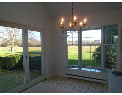 Other. Sunroom adjacent to kitchen with views over