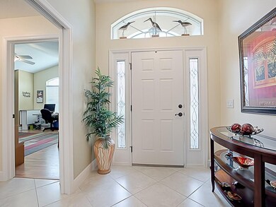 LOVELY FRONT FOYER ... POCKET DOOR LEADS TO YOUR G