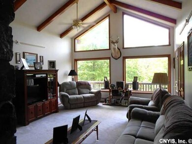 Dining Room. Dining with stone fireplace.