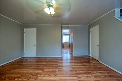 DININGROOM FACING THE FRONT OF HOUSE.CLOSET ON LEFT. DOOR TO BASEMENT ON RIGHT. APPROX. 15'X14'