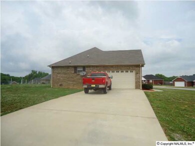 side view, concrete driveway