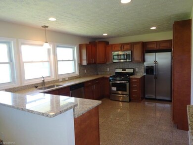 New Stainless Appliances and granite tops