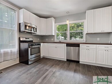 Large kitchen with plenty of storage and counter s