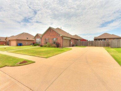Sideload garage with extended driveway