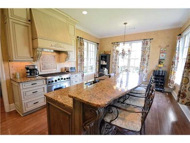Notice the pretty cabinetry with the on-trend neut