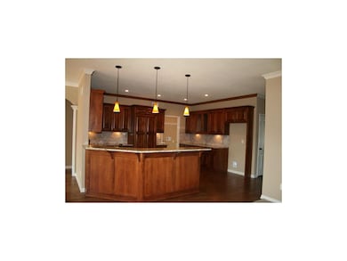 Beautiful kitchen with granite counters, hardwood 