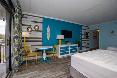 Bedroom featuring ornamental molding, baseboards, 