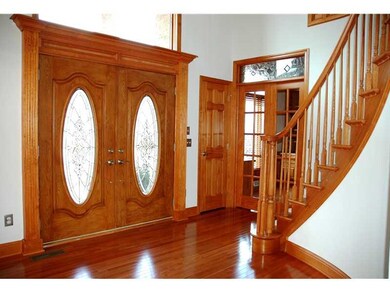 Entry/Foyer. Grand two story entryway with circvul