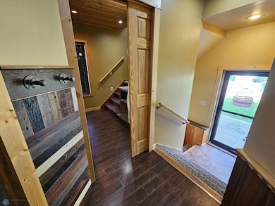 Pocket door to laundry/upstairs
