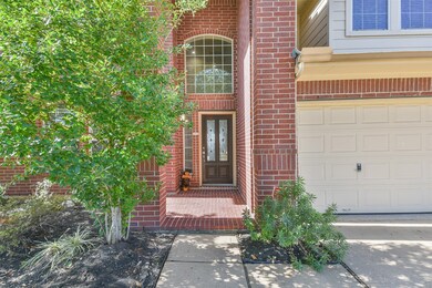 Beautiful front entrance with a solid wood and fro