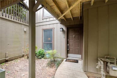 Entrance to property with board and batten siding