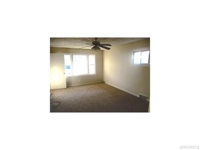 Living Room. fresh pain,t new carpet, custom plast