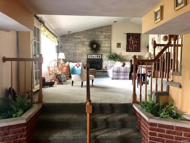 Enjoy family time around the gas fireplace in your large open living room.