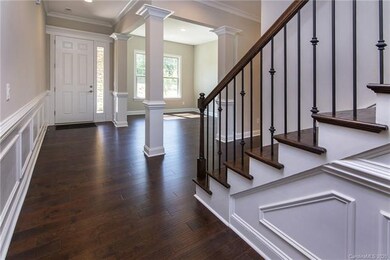 Lovely entry way with flex room and striking hardw
