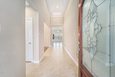 Welcome home to an inviting entrance featuring ele