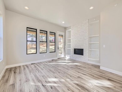 3883 Whispering Sage St, Evergreen, CO 80439 - photo 4