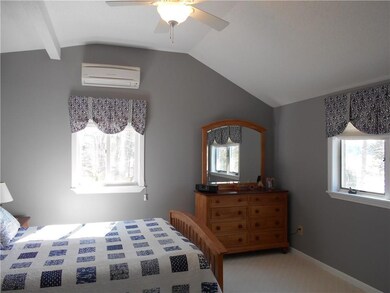 master bedroom w vaulted ceilings...