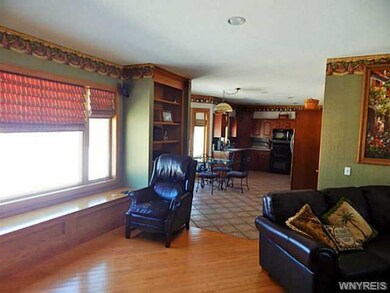 Family Room Looking into ceramic tiled kitchen