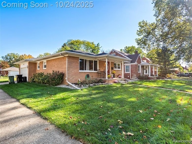 Ranch-style house with covered porch, brick siding, a front yard, and a chimney
