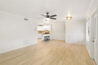 Living Room with view of dining room and kitchen