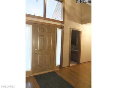Inside, the formal two story foyer gives a nice vi