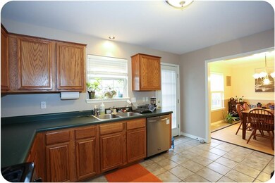 Access to deck is easy and great for those who like to BBQ, open to dining room is great for those who like to entertain.