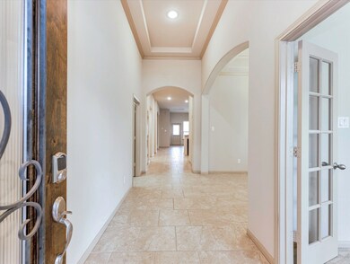 As you enter this home you are greeted by a long F