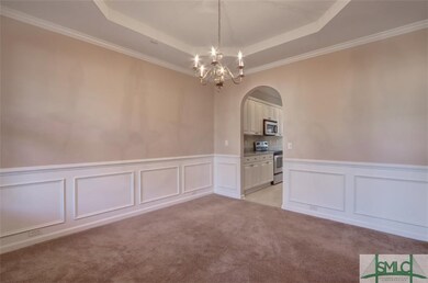 Dining Room with tray ceiling looking toward Kitch