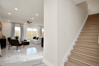 The home is flooded with natural sunlight. Welcome to your bright, open floor plan with high ceilings.