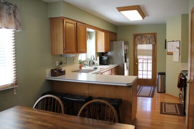 Spacious kitchen with SS appliances, a sunny windo
