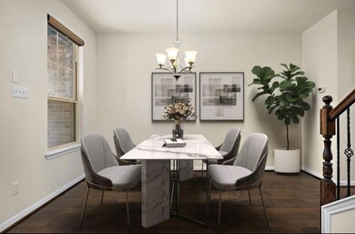 Dining area featuring dark wood-type flooring, a chandelier, and stairway