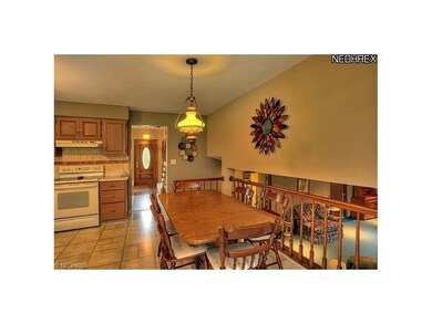 KITCHEN DINING AREA OVERLOOKS THE LOWER LEVEL FAMI