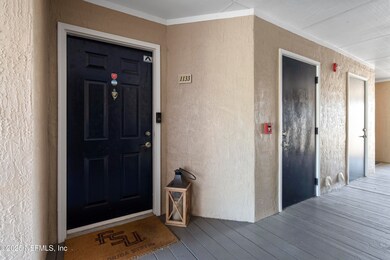 Front Door with Adjacent Storage Closet