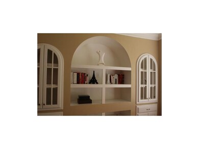 Graceful built ins in the family room/media room.
