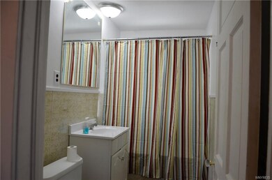 Freshly painted bathroom in upper unit with new wo